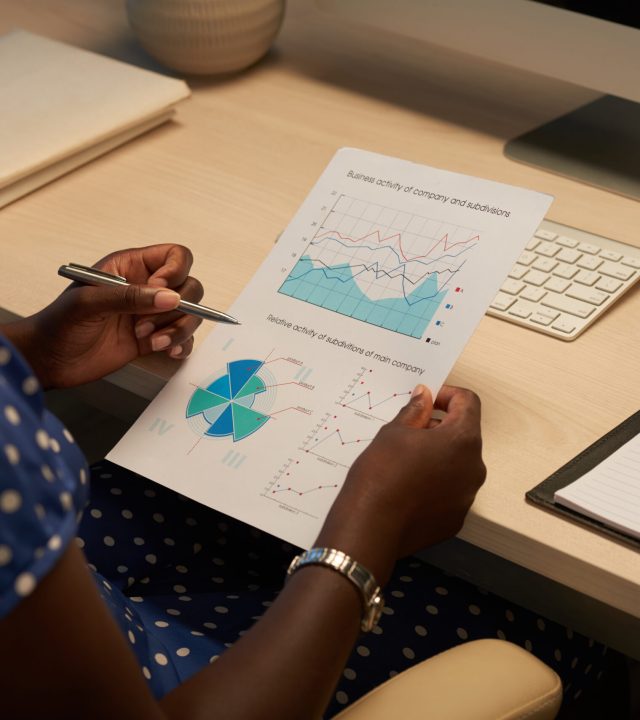 Female entrepreneur analyzing activity of her company